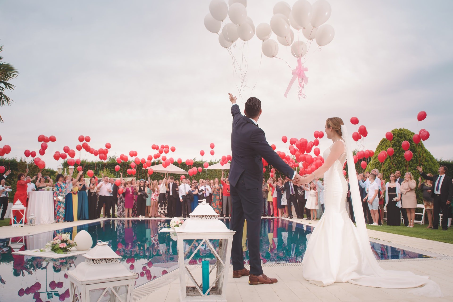 carnival wedding: releasing helium balloons