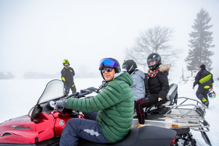 Snowmobile racing at a company event in the Karkonosze Mountains